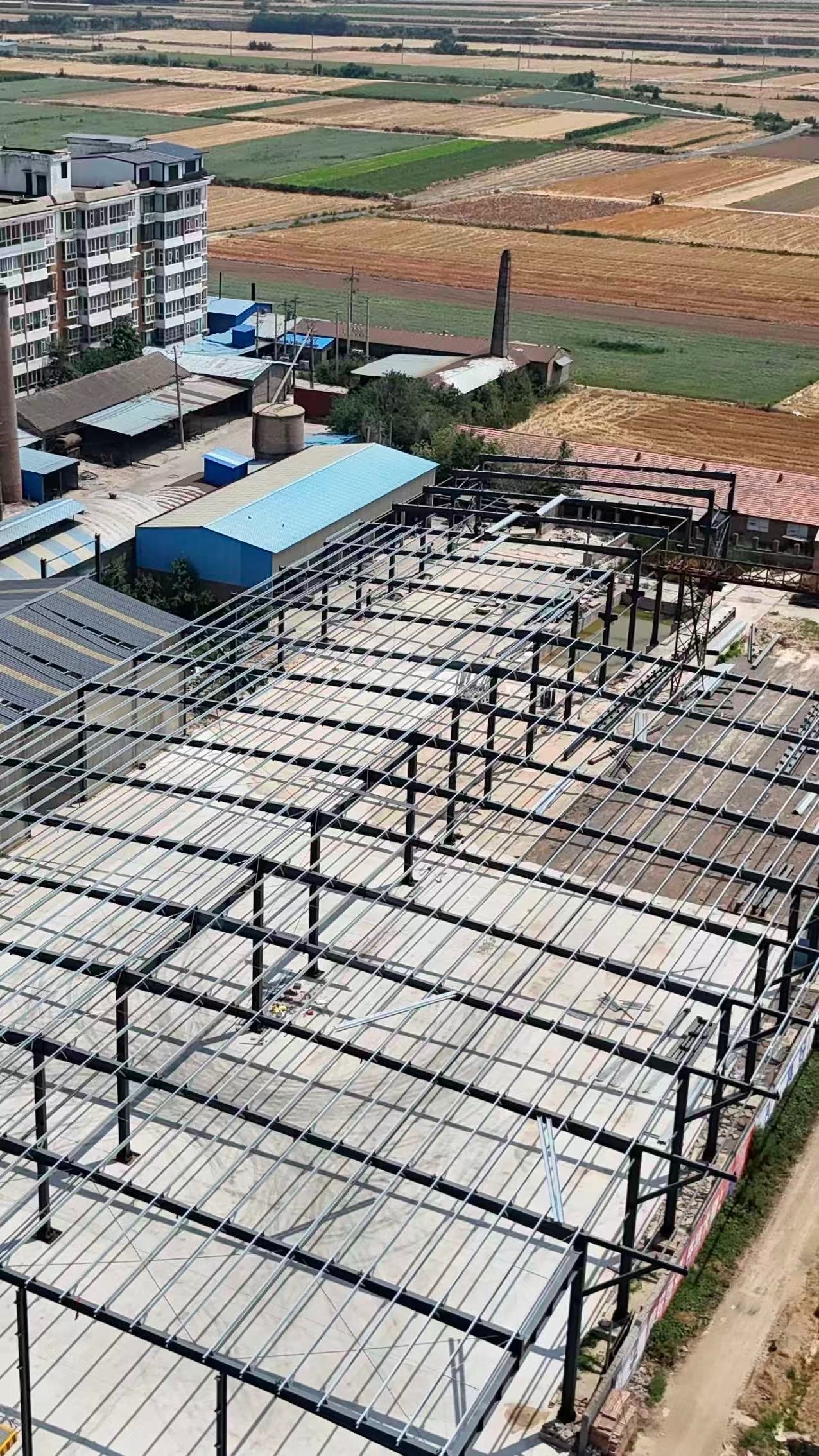 Steel frame and secondary roof members during workshop construction